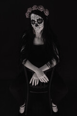 woman look as Death sit on chair and spread legs