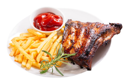 plate of grilled pork ribs with french fries isolated on transparent background