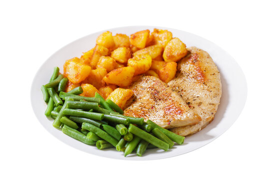 Plate of grilled turkey chops, baked potatoes and green beans on transparent background