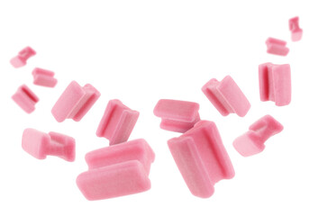 Many bubble gum pillows falling on white background