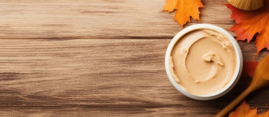 Autumn beauty treatment with homemade pumpkin mask in a white bowl