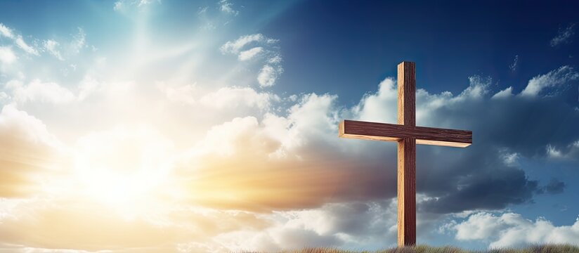 Digital composite of a wooden cross against the sky on Ascension day with copy space Celebrating the holiday religious tradition and belief