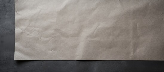 Mockup with space for text on a gray and black textured paper background