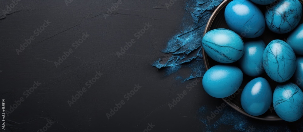 Poster hand painted blue easter eggs on a dark background minimalist composition top view flat lay with spa