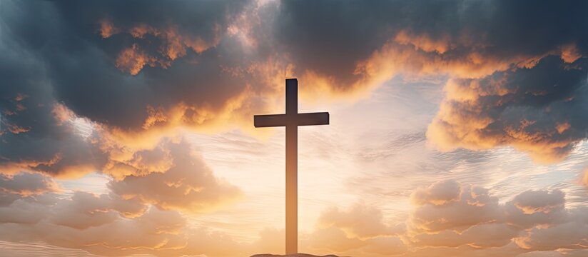 Digital composite of a wooden cross with cloudy sunset sky representing Ascension day and Christian beliefs