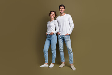 Full length photo of positive good mood wife husband dressed white shirts walking isolated brown color background
