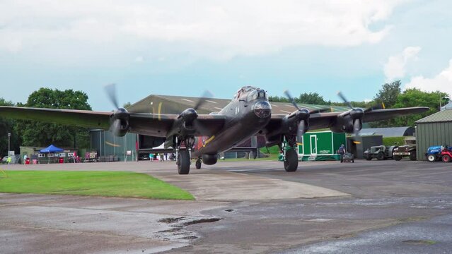 Video of the famous second world war Lincoln Bomber airplane taxing along on a RAF air-force base in Lincolnshire UK