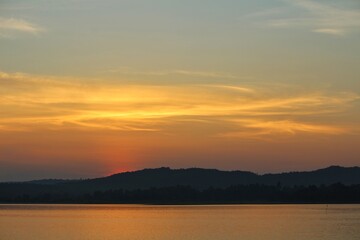 As the sun sets, its golden rays cast a warm and enchanting glow over the landscape. 