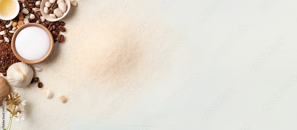 Poster top view of white background with coffee scented spa salt oil loofah and soap representing the conce