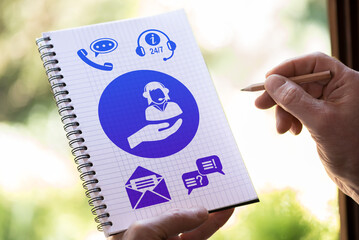 Customer service concept on a notepad