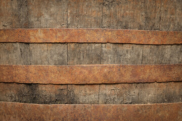 Traditional wooden barrel as background, closeup. Wine making