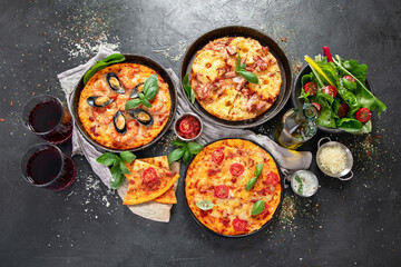 Assortment of various type of Italian pizza.