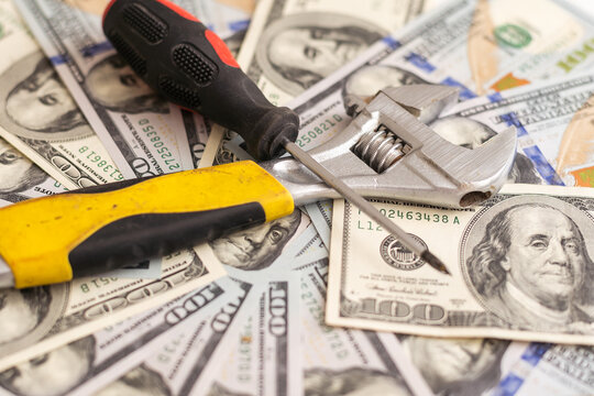 The dollar banknotes and tools