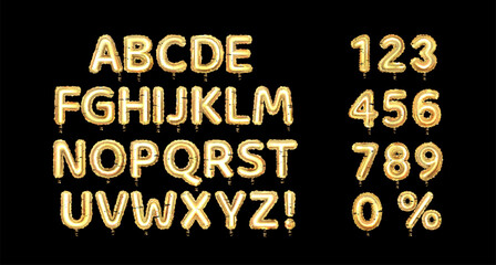 Set of golden balloon alphabet and numbers, isolated on black background.  © Aliona Manakova