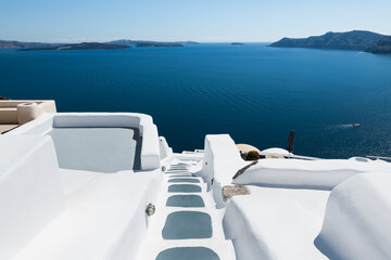 White architecture in Santorini island, Greece. Luxury hotel with sea view.