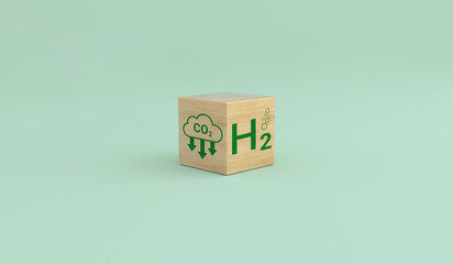 Wooden cube block with icons of H2 and carbon emissions.Sustainable Green Energy.