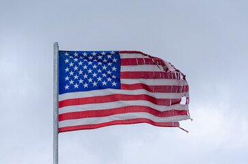 U.S. flag damaged by the weather