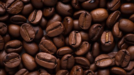 Fototapeta premium Overhead view of a backdrop featuring two dark-brown, fragrant coffee beans