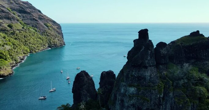 View of Bay of Virgins from behind mountains on Fatu Hiva Marquesas Islands French Polynesia in South Pacific Ocean