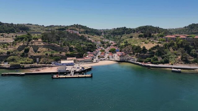 Drone shot of the ferry point and the tiny beach at Porto Brandao, Portugal.