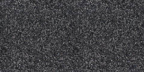 Asphalt seamless texture, grunge rough surface of tarmac, seamless dark grey road grains, texture background, close-up, top view