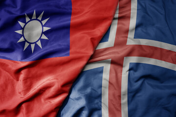 big waving national colorful flag of taiwan and national flag of iceland .