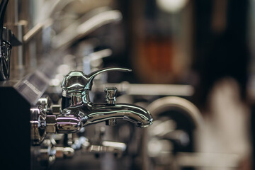 Modern kitchen water faucets in the store