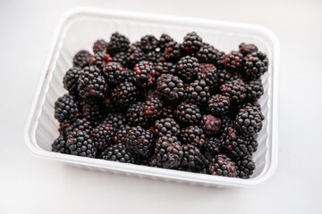 Fresh and ripe natural looking blackberries. Selective focus.