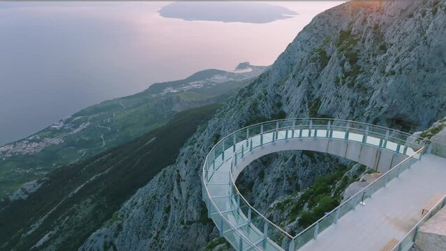 Sunset view of the famous skywalk at the top of the Biokovo Nature Park in Southern Croatia built for sustainable tourism, Drone shot
