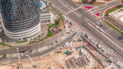 Aerial view construction site with a foundation pit of new skyscraper timelapse.