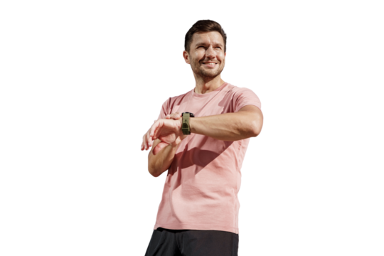 The man uses a fitness app and watch accessories.  A runner is an athlete, a strong confident person in a full-length T-shirt, a healthy lifestyle. Sports jogging.