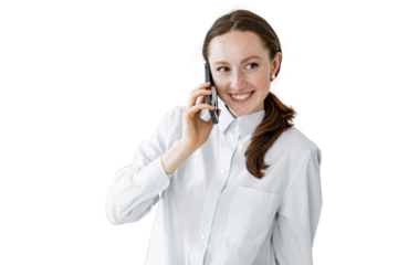 A woman uses a phone in the office. An employee of the company is talking to a client. A happy manager in a white shirt smiles.