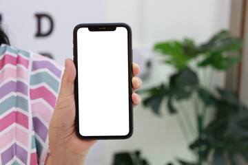 Hand holding mobile phone white screen 