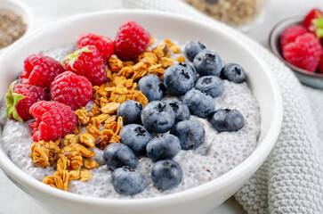 Healthy Chia Pudding Bowl with Granola and Fresh Berries