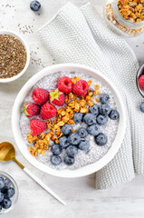 Healthy Chia Pudding Bowl with Granola and Fresh Berries