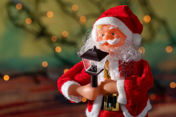 Santa Claus and Christmas puppets on abstract background with copy space