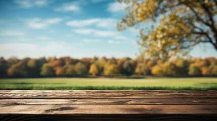 Naklejka na ściany i meble Empty wooden table with a serene meadow and trees
