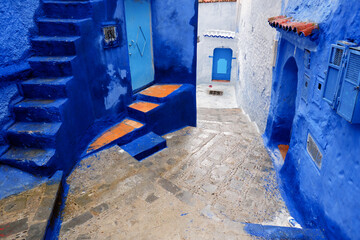 Street with stairs in Chefchaouen, the blue city in the Morocco. Old traditional town.