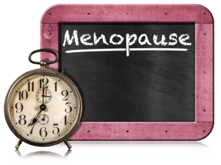 Closeup of an old alarm clock and a blackboard with text Menopause, pink wooden frame and copy space. Isolated on white or transparent background. Png.