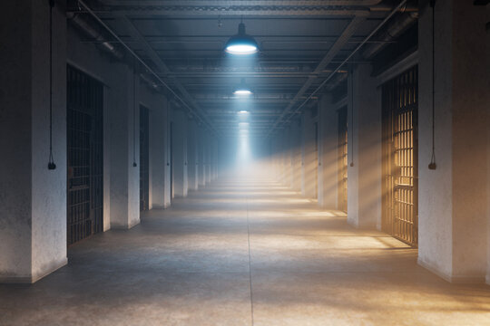 A dark corridor of jail with light shining through small windows in misty cells - Powered by Adobe