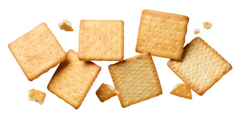 Crackers cookies with pieces are flying on a white. Isolated - obrazy, fototapety, plakaty