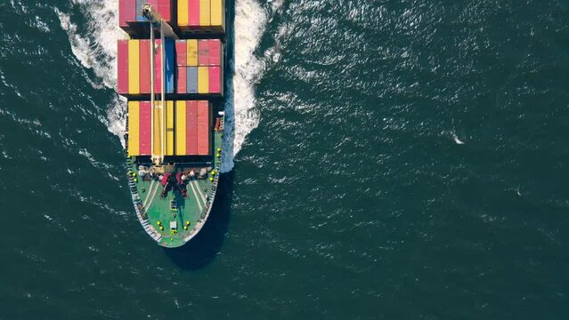 Aerial top view container ship full load container for logistics import export, shipping or transportation