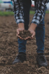 Symbol heart earth day. Handful of dirt hands heart shape. Farm organic earth. Farmer hands soil ground earth dirt garden soil farm ground. Male hands full of fertile land field agriculture concept