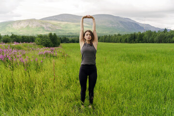 Woman Pose asana, sportswear. A person is mentally working on the balance and harmony of the soul....