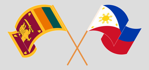 Crossed and waving flags of Sri Lanka and the Philippines