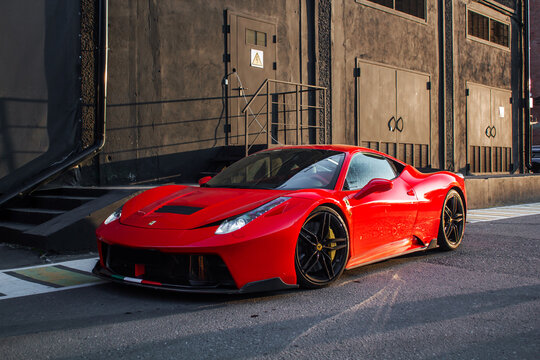 red sports car on the street Ferrari 458 Italia