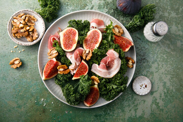 Healthy kale salad with figs and bacon