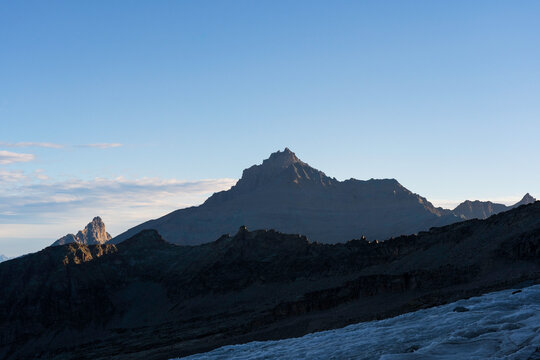 View of Grivola mountain among Valsavarenche and Cogne valley from Gran Paradiso glacier at sunrise