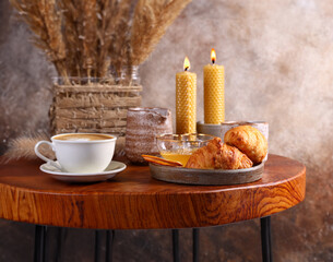 cup of coffee and croissant for breakfast still life