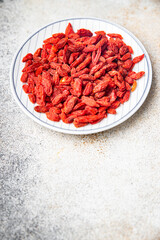 Goji berrie supplement healthy meal food snack on the table copy space food background rustic top view